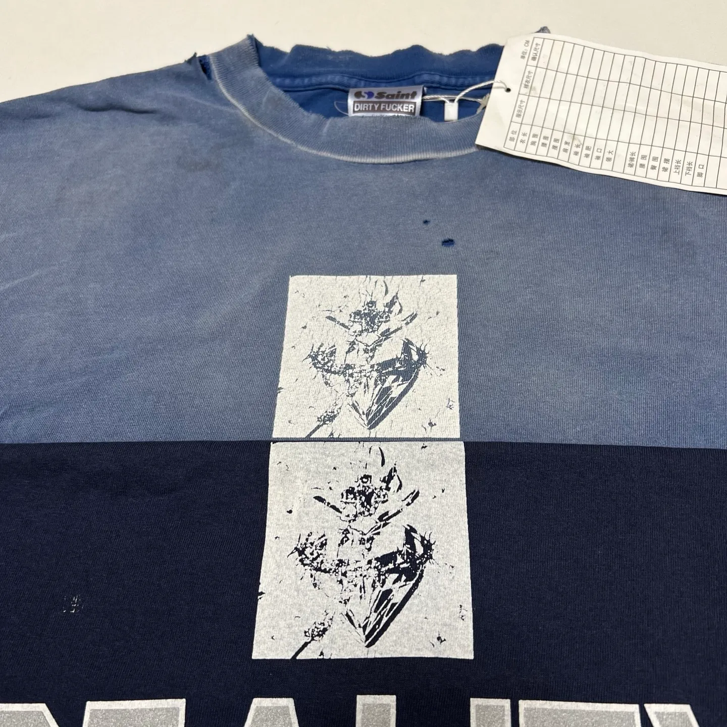Printing proofing SAINT Mxxxxxx REALITY SCHOOL SS_TEE/NVY Slogan distressed short-sleeves Washed blue S-XL Garment dyeing Ma Liu fading Super complex shearing and destruction treatment Correct version Cylindrical fabric Customized original consistent main mark/wash mark Original consistent silver powder printing Distressed treatment